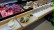 Buffet mit Smoothies, gesunden Wraps, Zucchini-Möhren-Puffer und Rohkostschlange aus Gurken und Tomaten